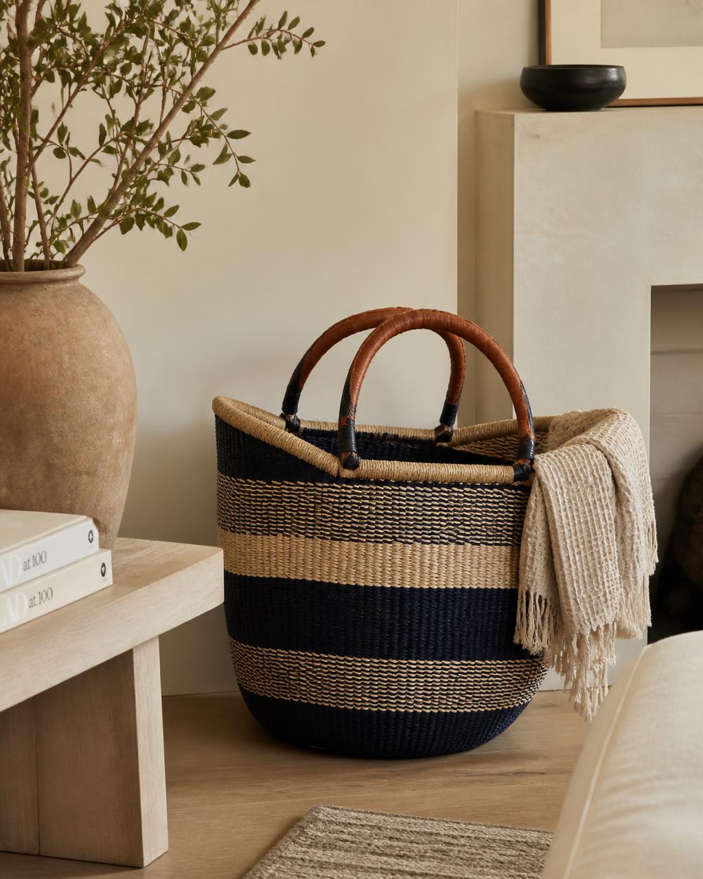 Handwoven Bolga basket coiled from dyed elephant grass in Bolgatanga, Ghana